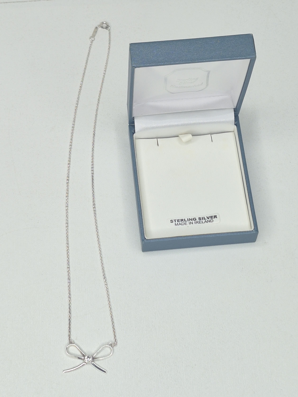 Facet Ireland 925 Sterling Silver Bow Necklace in Gift Box